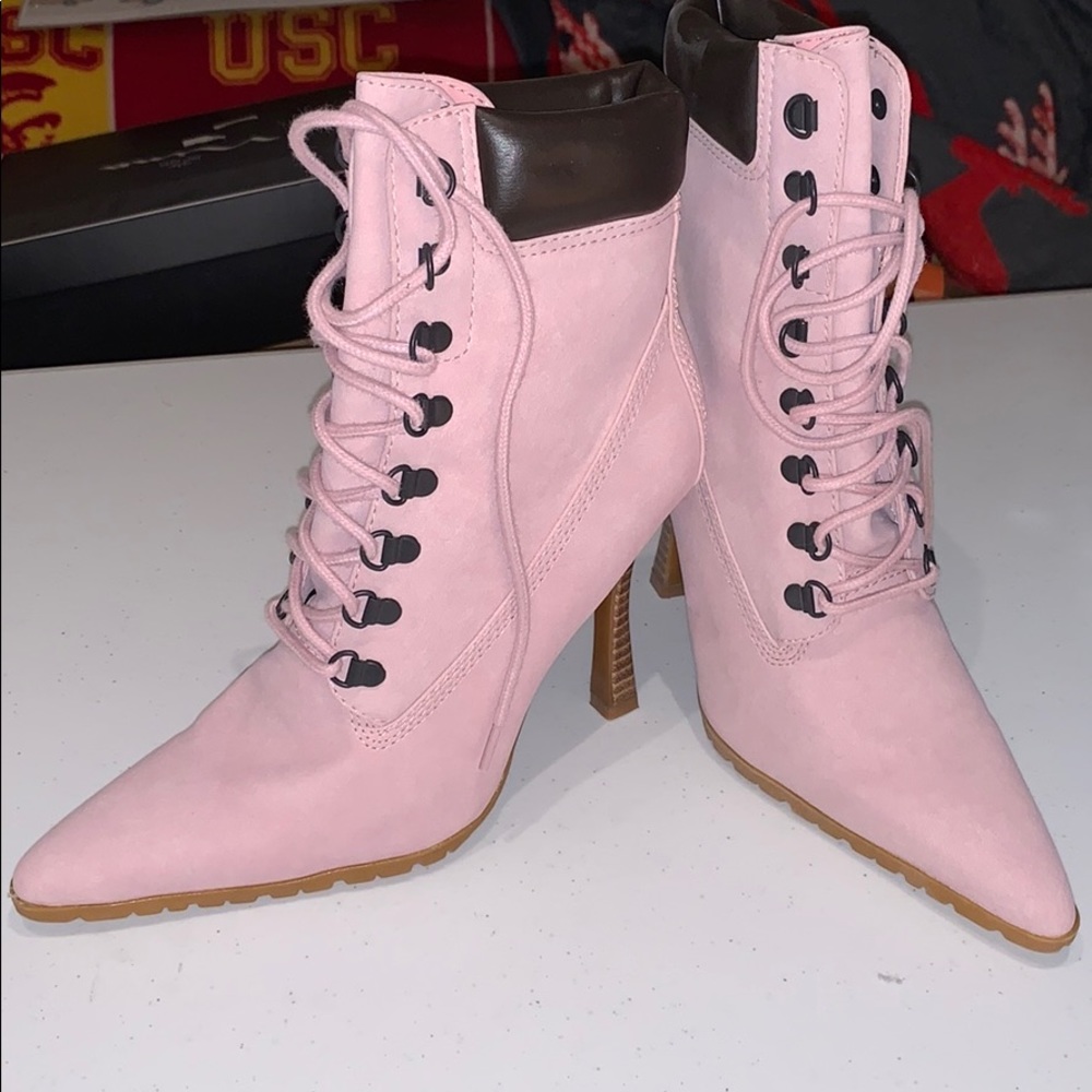 Pink high heeled booties